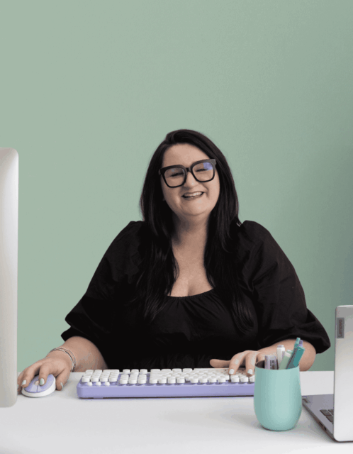 Green-background-headshot-typing-words-by-bonnie-copywriter-brand-FINAL